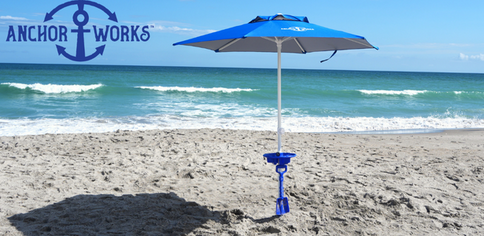 Beach Umbrella with the Anchor Works Logo in the top left hand corner